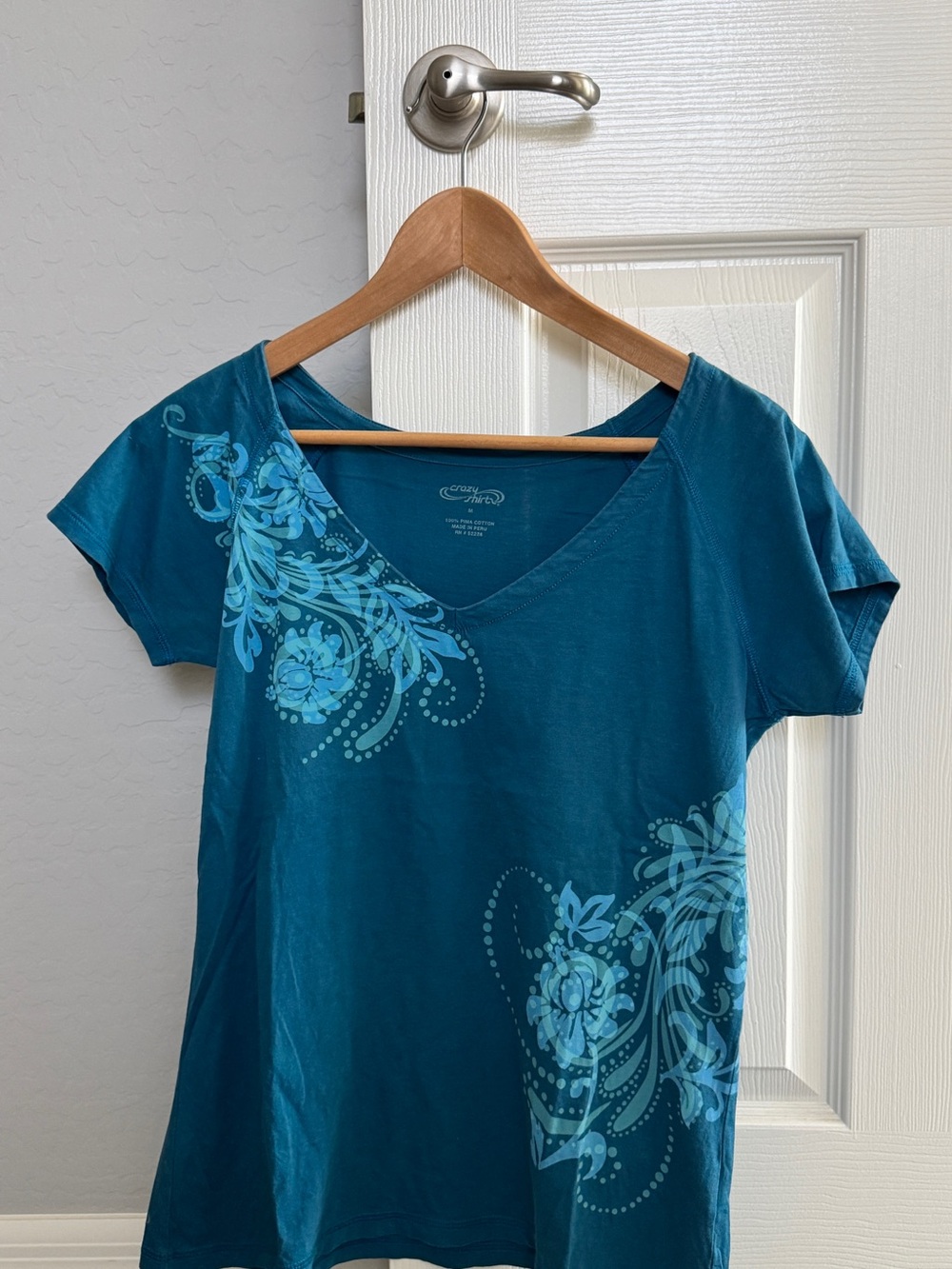 Teal Floral V-Neck Women’s Tee. Crazy Shirt